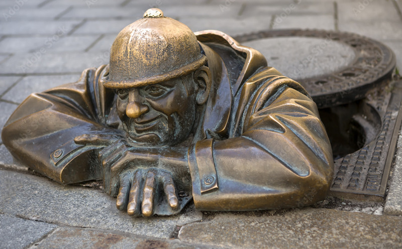bronze man at work