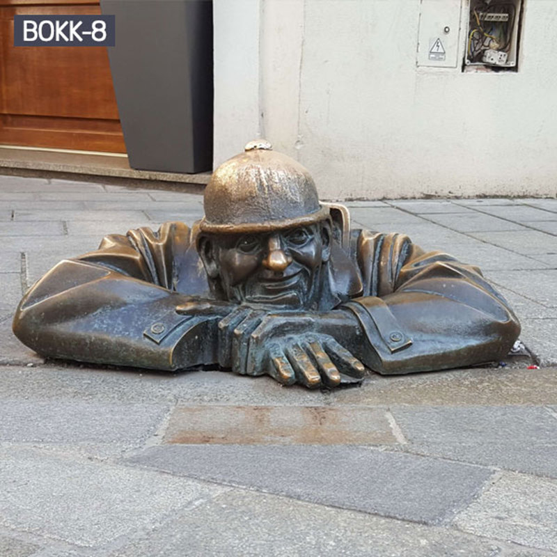 man at work statue-