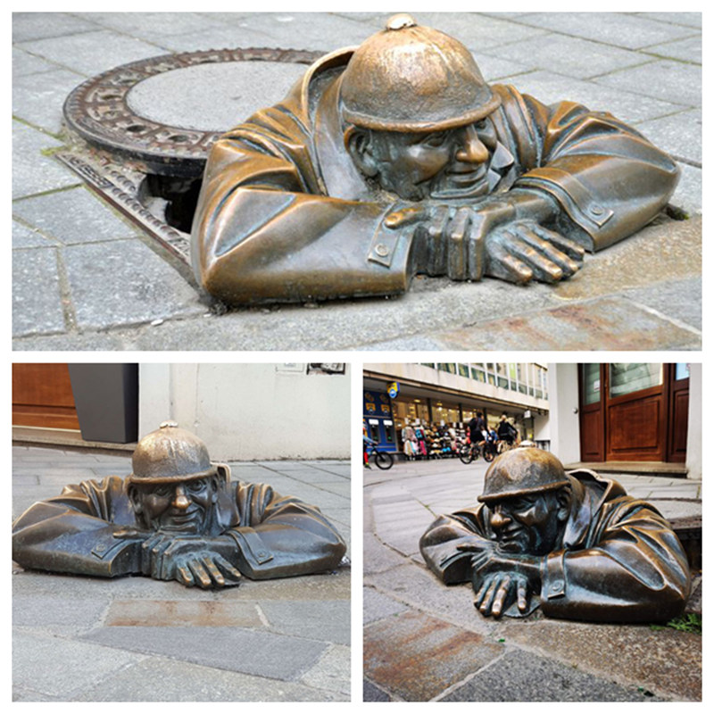 man_at_work statues-